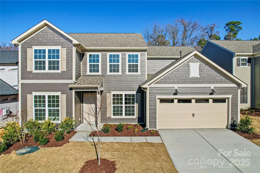 Welcome Home to Patterson Pond and the wonderful Wingate plan featuring a Guest Suite on the main level.  This intimate community features the tranquility you are seeking, and close and convenient to everything you want here in Fort Mill. This beautiful home offers a spacious open floor plan with Gourmet Kitchen, Cafe and Gathering Room with cozy fireplace. The Planning Center off the Kitchen makes for a perfect home office or home work station.  Enjoy features such as Tray Ceiling in the Owners Bedroom and Dining Room as well as a Owners Bathroom with soaking tub and walk in shower.  Great Fort Mill Schools!