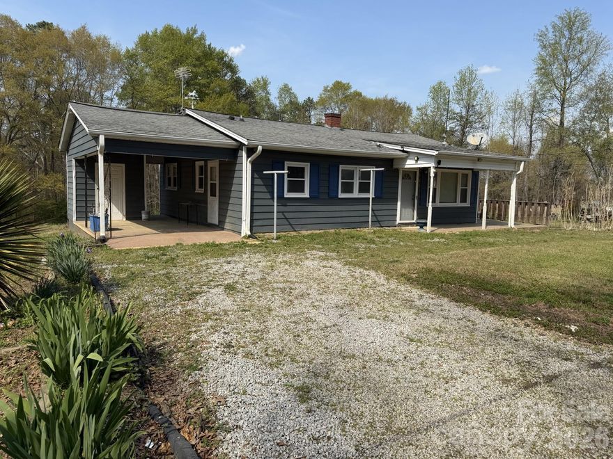 Excellent investment opportunity for first time home owner or investor.  Large relatively flat lot of approximately 1 acre.  Previously a trailer sat on the extra parcel but has since been removed.  Many of the upgrades and renovations have already been started.  County records show 2 bedrooms but a 3rd room could be used as an office or bedroom.  The property is at the end of a private drive that is just a couple minutes to Highway 74.