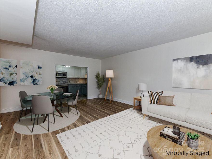 Beautifully updated (and freshly painted) First Floor unit with two Balconies and exceptional views!  Very private location on the first floor, and you don't even need to use the elevator.  Completely updated Kitchen in 2023, featuring white and gray cabinets, granite countertops, Stainless Steel Appliances and stylish subway backsplash.  Kitchen opens to Great Room with views of tree lined street.  All new LVP flooring, plantation shutters and door screens.  Bathrooms remodeled with updated fixtures, lighting and countertops.  Renovated, elongated walk in shower with tile floor and decorative tile accents.  HOA dues include TAXES, water & cable and all common areas. Newly opened (2024) Fitness Room is located on the 6th floor + there is a lovely outdoor Pool.  Can't beat this location with private, covered bridge access to shops and restaurants in Park Road Shopping Center plus short stroll to Greenway access.  Easy commute to Uptown, SouthPark and the Airport. Designated carport parking space is #31-conveniently located right across from Exit, Storage Space in Basement.  For extra company there is an available Guest Suite that rents for $60 a night. There is also the Skyview Room available for $75 a day for entertaining.  The Kimberlee is a COOP. Ownership transferred by stock certificate / not deed !