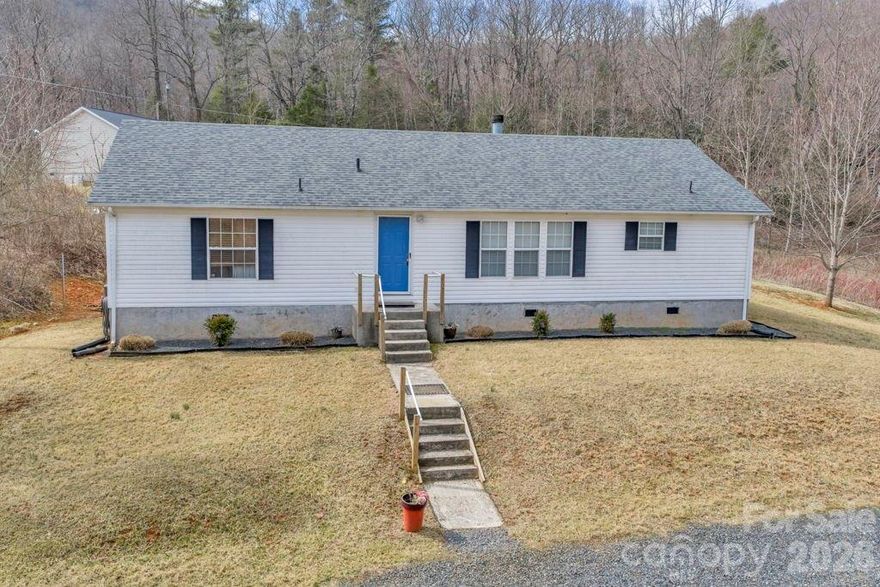 Well-maintained 3 bedroom, 2 bath on-frame modular home on 1 acre in a desirable location in Spruce Pine. This home offers a great layout with comfortable living spaces and thoughtful updates throughout. The living area features a cozy fireplace, perfect for relaxing evenings, while the kitchen includes granite countertops and plenty of workspace. Major systems have already been updated for peace of mind, including an HVAC system only 2 years old and a roof just 5 years old. Step outside to enjoy the large back deck, ideal for entertaining, grilling, or simply taking in the peaceful surroundings. The property offers space to enjoy the outdoors while still being conveniently located close to town.