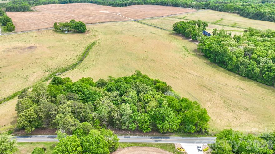 Discover the perfect opportunity to own 8 beautiful acres just minutes from Downtown Monroe. This unique property showcases a stunning rolling landscape, complete with a scenic views and a peaceful pond—ideal for creating your dream home or private retreat. Enjoy the convenience of county water already available, along with the flexibility to subdivide, making this an excellent option for builders, investors, or those seeking room to grow.
Whether you envision a custom estate, a family compound, or a smart investment, this property offers endless potential. Opportunities like this—offering size, location, and flexibility—are becoming increasingly scarce.
No soil testing has been completed.