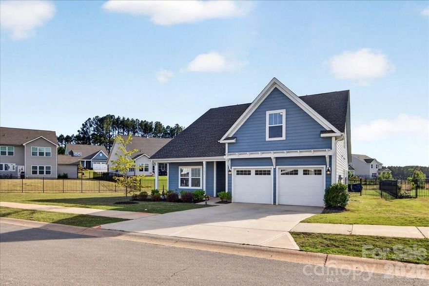 This stunning 3-bedroom, 3-bath home with a loft and bonus room is located in the award-winning Edgewater community. The gorgeous kitchen is a true centerpiece, featuring granite countertops, a gas stove, upgraded appliances, abundant cabinetry, a butler’s pantry, a spacious secondary pantry, and an oversized island with a farmhouse sink.

The main level offers a bright and open layout with a great room, breakfast nook, formal dining room, and a private guest suite with a full bath. Oversized windows fill the home with natural light, and luxury vinyl plank flooring extends throughout most of the first floor.

Upstairs, you’ll find a generous loft, a third full bathroom, an additional bedroom, and a versatile bonus room that can easily serve as a fourth bedroom. Storage is plentiful, with ample closet space on both levels.

Step outside to a covered lanai overlooking a flat, fenced-in backyard—perfect for relaxing or entertaining.

Living in Edgewater means enjoying a top-ranked public golf course, an amazing on-site restaurant, swimming pools, pickleball and tennis courts, and a recreational lake ideal for boating and fishing. Plus, new retail shopping is coming soon.

All appliances remain!