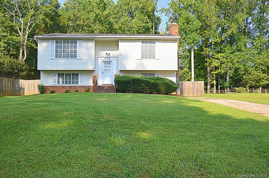 AFFORDABLE & CHARMING! This Split Level is very CLEAN w/Mature Landscaping! Situated on level, fenced lot in Mature Neighborhood. LL Large MSTR Suite on offers Private BTH. Cozy Den w/Masonry Fireplace also on LL. Use NEW Sliding Glass Door to step onto FRESHLY STAINED Deck overlooking HUGE flat rear yard! Efficient Kitchen! No Inspection Hurdles or HOA's! Deep lot w/Storage BLDG! NEW HVAC-2011! What you've been looking for!  WONT LAST LONG!! Bring your HOUSE CHARLOTTE ELIGIBLE BUYERS!