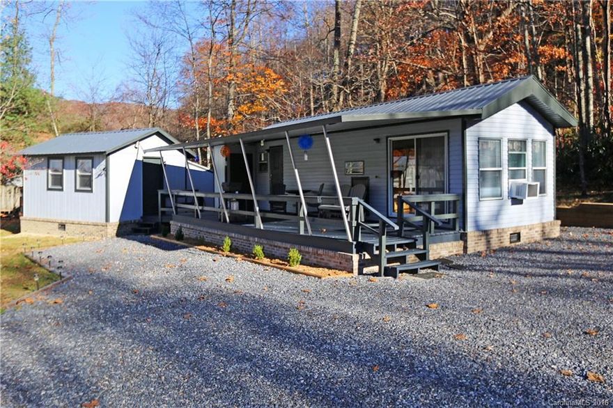 Like new & totally renovated mountain weekend getaway, a must see, w/open floor plan, vaulted ceilings, 1 bedroom, 1 bath, new metal roof, tub & shower,  permanent brick foundation, separate finished heated & cooled bonus room, paint throughout, huge covered front deck, city water & sewer, level entry and access, and end of the road privacy.