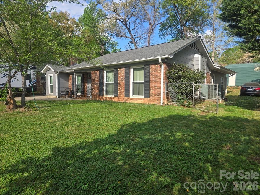 Welcome to this well maintained, 4-bedroom residence located in the highly desirable Harrisburg area. Boasting over 1,700 square feet of thoughtfully designed living space, this home features a remarkably spacious great room (12.5' x 21.5')—complete with elegant built-in cabinetry—offering unparalleled flexibility for both relaxing and hosting grand entertaining events. While featuring a Charlotte address, this property is situated in Cabarrus County, combining convenience with the charm of suburban living. Ultimate Primary Suite and Outdoor Living Escape to the generous primary suite (12' x 18'), designed as a private sanctuary for comfort and relaxation, large enough for a king-sized bed and a dedicated sitting or workout area. The en-suite bathroom boasts dual vanities, complemented by a substantial walk-in closet. A standout feature of this suite is the sliding glass door leading to an expansive, over 670 sq ft outdoor patio. This rare, oversized outdoor living space offers the perfect venue for morning coffee in the fresh air or evening entertainment, providing the ideal indoor-outdoor lifestyle. Don’t miss this opportunity to make this versatile, spacious home your own.
