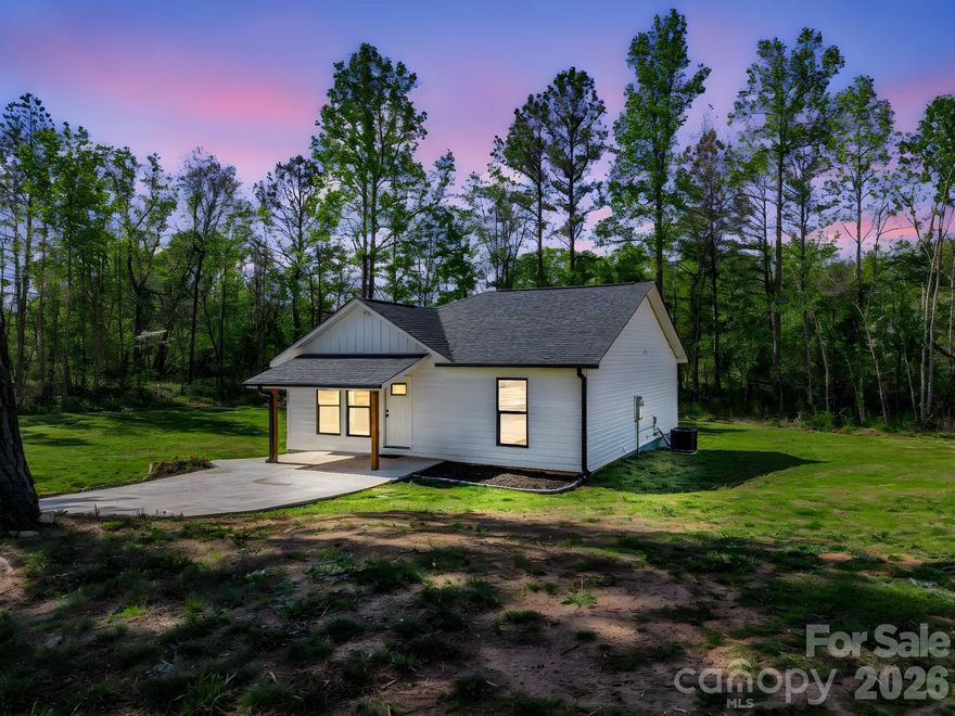 Seeking a peaceful place to call home? Discover this modern farmhouse on just under an acre in rural Bostic. Enjoy morning coffee on the expansive covered deck while taking in serene natural views, then take a short 15-minute drive to historic Forest City for dining and shopping. This well-appointed residence offers 2 bedrooms, 2 bathrooms, and an open-concept living room and kitchen—ideal for comfortable, relaxed living.