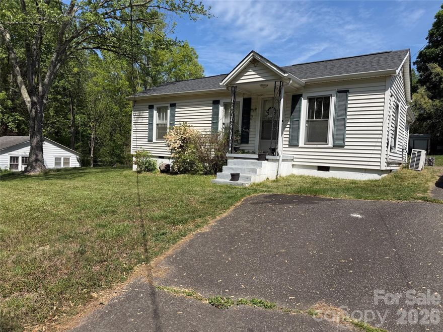 Great bungalow located on quiet dead end street. The living room offers some built in shelving. Great for displaying your photos or collectables. The original hardwood floors reman through out lots of the home. The kitchen is very spacious. The covered patio is a great spot to enjoy your private backyard. In the backyard you will find a storage building. This a great spot for all your yard equipment. This home is conveniently located to Hwy 70, Hwy 321 & I-40. Come check out this charming home.