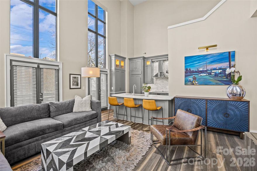Luxury living in the heart of South End! This beautifully designed 2 bedroom, 2 bath home offers 1,277 square feet of high end style and functional living space in one of Charlotte’s most sought-after neighborhoods. The two-level floor plan creates the perfect blend of openness and privacy. The main level features a spacious living room that flows seamlessly into the kitchen making it ideal for entertaining or everyday living. Complete with premium appliances, sleek finishes, and oversized windows with ample natural light. A secondary bedroom and full bath on the main level offer the perfect space for guests or a home office. Upstairs, the private primary suite is a true retreat, including a versatile loft space overlooking the living area below. Whether you need a workspace, reading nook, or additional lounge area, this flexible layout adapts to your lifestyle. Enjoy the convenience of two assigned parking spaces with entry FOB, plus access to a community rooftop terrace with stunning skyline views — the perfect spot to unwind or gather with friends. Experience everything South End has to offer just outside your doorstep including top-rated restaurants, breweries, boutique shopping, the Rail Trail, and light rail access. With its unbeatable location, premium amenities, and thoughtfully designed layout, 115 E Park Ave #101 delivers elevated urban living at its best!