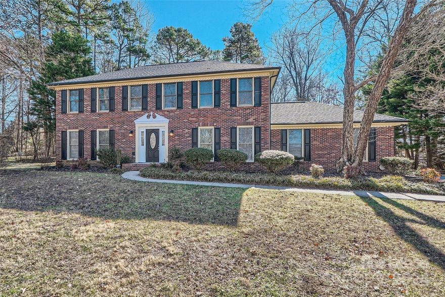 The Settlement at Withrow Downs, 106 Wthershinn Drive, is an updated 5-bedroom home on an ½  lot. The kitchen has all-new white cabins, countertops, and appliances. The kitchen is open to the dining area and great room, with a fireplace and deck access. There is also a dining room and living room that can be used as an office.  The primary suite is upstairs; the bath has a jetted tub, a separate shower, and a walk-in closet. There are 4 secondary bedrooms and a full bath. The whole house is newly painted and new LVP flooring, plus more. Step out the backdoor in the great room to the deck overlooking a large backyard.  The settlement has a great community pool, clubhouse, and playground. Plus, it's located at the junction of I-85 and I-485, making it convenient to the university, shopping, and restaurants.