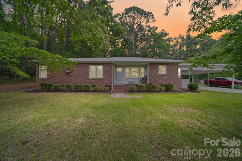 Photo of 303 E Allenton Street, Mount Gilead, NC 27306 (MLS # 4379088)
