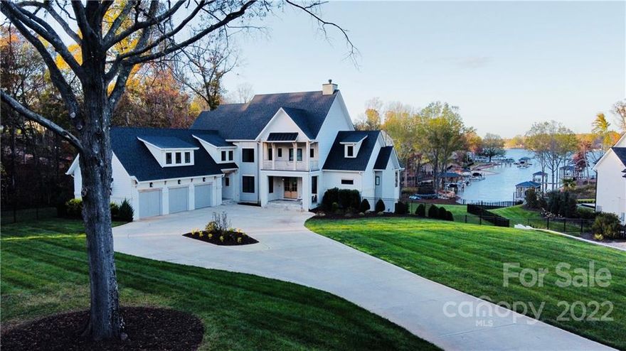 Virtually new construction (2020) on 1.5 secluded acres on Lake Norman! This incredible home is the only home on a quiet cul-de-sac buffered by 3 acres of green space on one side and 100 feet of Lake Norman shoreline on one the other. The beautiful long lake views are complemented by the 11 other recently constructed luxury lake homes that comprise the neighborhood.

The features that make this home special are extensive:

- 2-story chef's kitchen with Thermador appliance package and beautiful scullery with separate sink/dishwasher
- Extensive custom wood beams and tile features
- Two offices on main in addition to a music/flex room, oversized laundry and owner's suite
- 4 bedrooms with loft, entertainment room, bunk room and game room upstairs
- Retractable screen at back porch
- Garage for lake storage/access in unfinished basement waiting to be customized
- Perfect yard for incredible pool!
- Stone sea wall 
- Duke approved for dock

Listing agent is owner.