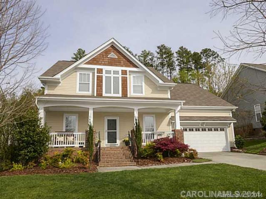 Beautiful craftsman style home with open floor plan & gleaming hardwoods, great room w/ vaulted ceiling, corian counters in the kitchen, laundry room on main, master retreat on main w/ tray ceiling. Private backyard w/ patio, deck & mature landscaping. Perfect for nature lovers. Storage galore! Convenient to I-77, shopping, restaurants & schools. Enjoy the lake, walking trails, pool, golf, tennis. Relocation Addendums Apply.   Chandelier in upstairs bedroom does not convey.