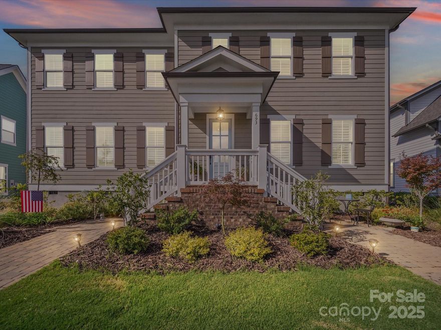 This exceptional home is located in popular Riverwalk and will not disappoint.    From  the huge foyer with office and den just off the foyer to the formal dining room, great room with electric fireplace, and the large kitchen with ample counter space, this home is an entertainers dream. Quartz counter tops, upgraded faucet, pantry and new upgraded cabinet hardware and two large casement windows make this kitchen very desirable. The covered deck with ceiling fans and the stone pavers leading to the firepit add to your options for entertaining.  Other features include plantation shutters, main floor primary bedroom with custom closets, double vanities in primary bathroom,  large guest suite and two additional rooms on upper level,  space for a reading area.  Three car finished garage with epoxy flooring provides plenty of vehicle space. Enjoy the neighborhood swimming pool on a hot summer day or launch your kayak on the Catawba river.  Current property taxes $5,465.  This home potentially qualifies for up to 8 down payment assistance programs up to $37,950 !