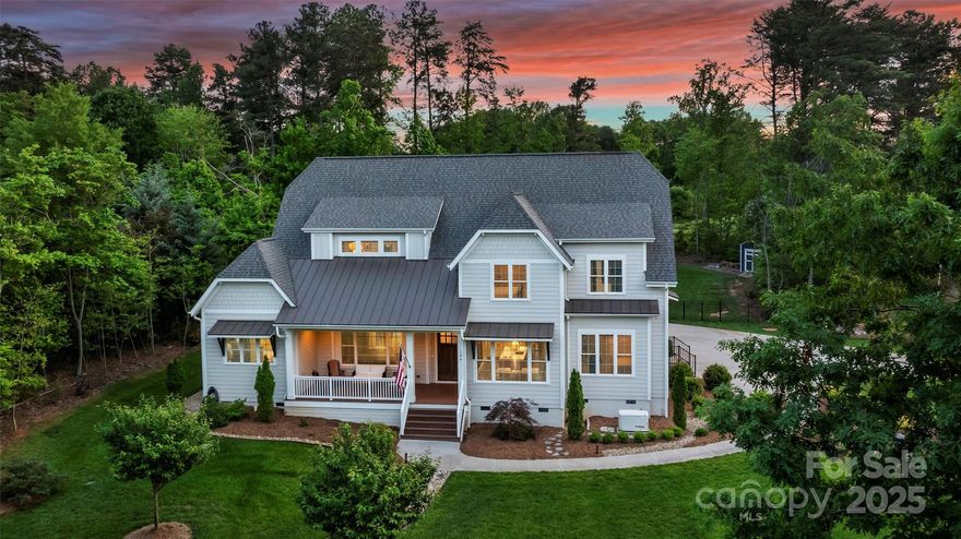 Welcome to 106 Thunder Hill, a beautiful home built in 2021 where you'll find timeless architecture & designer finishes in the highly sought-after location in Mooresville - just beyond The Point. From spacious open floor plan to the multitude of flex spaces, this home offers the best in comfortable living and classic design. The exquisite chef’s kitchen features quartz countertops & high-end appliances which opens to the living room & dining area. The main-level primary suite includes a stunning primary bathroom, large walk-in closet with built-ins, and access to your porch. An add'l guest suite is also located on the main level. Step outside to your own private backyard oasis with a new heated pool/spa - perfect for entertaining and enjoying year round! Upstairs, you’ll find 2 bedrooms, a bedroom / bonus room and 2 large bonus/media room with 2 full baths. Located a short distance away from Trump National Golf Club Charlotte for the best of golf, tennis, pool, fitness & lake living!