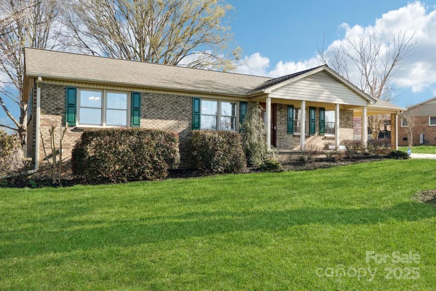 Perfect location in a sought-after neighborhood.  This home has 3 bedrooms, 2 full baths, full brick, .67 flat acre lot, newly fully fenced backyard, new LVP flooring throughout, timed irrigation, high end appliances, newer windows, two hot water heaters (gas and electric), building in back conveys and has electricity, screened in back porch with a heating element, a swing in the backyard already hung from one of your tall trees, ramp in carport for accessibility that can stay or be removed at your request, a step in shower in primary, full bath and shower in second bathroom, and the best part is that it is conveniently located to South Carolina as well as Boiling Springs, Shelby, Gastonia, Belmont, Mount Holly, or Charlotte.  This location is super close to interstate 85, casino, downtown Kings Mountain, SC or NC restaurants and shopping, CLT International Airport, theatres, coffee shops, parks, and more.  This home is ready for someone to call it home!