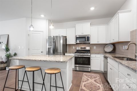 Photo of 215 Harpers Run Lane, Matthews, NC 28104 (MLS # 4336514)