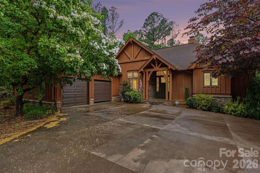 Experience the ultimate lakeside retreat in this beautiful 4-bedroom, 2.5-bath home located in a private, gated community on High Rock Lake. The interior boasts stunning hardwoods throughout, a versatile bonus room, and a finished basement featuring a dedicated workshop. Wake up to serene water views from the primary suite, which includes its own private screened-in porch. This home offers unmatched convenience, starting with a shared boat slip that provides effortless access to the water. Inside, storage is made simple with an automatic attic lift, allowing you to move heavy items into the rafters with the touch of a button.