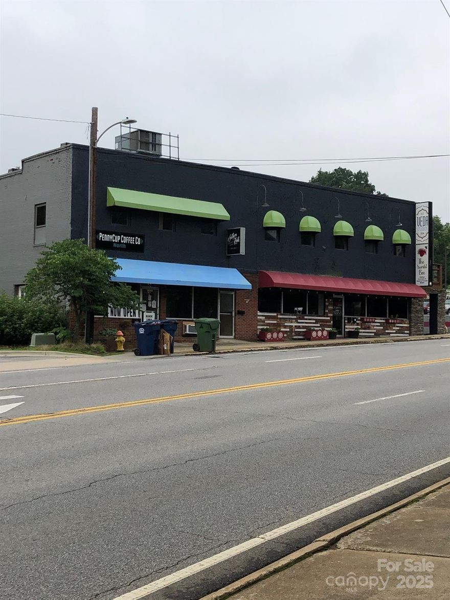 A rare property, two parcels together offering .78 acres, 130' of frontage on Merrimon corridor in North Asheville. Can be a redevelopment or investment opportunity with high traffic (17,500 cars/day) in the heart of the desirable Grace Neighborhood. One mile from downtown Asheville, 1/2 mile from UNC-A.    The area is just south of the very desirable Beaver Dam and Asheville Country Club area, and is known for walkability and proximity to downtown.

The Grace Building is on the highly trafficked Merrimon Ave. (17,500 cars daily) with 130’ of frontage.  Pro forma suggests a cap rate of 7.5% with spaces full at market rates. Plenty of surface parking especially with the included 0.31 acre lot behind the building. With some renovation and/or creative re-development, given its desirable location, this is a strong, long-hold investment.  The property is zoned CBII and RM enabling a multitude of uses, including retail, food / beverage / brewing, professional office, medical office, fitness and art studios, among others.  There are 5500 residences within 1/2 mile of this location.