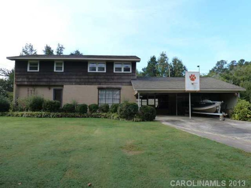 A lot of house for the money, This two story brick home has 4 to 5 bedrooms, 3 baths, living room, dining room, den, kitchen breakfast area, screen porch, and db carport. Very nice work shop and fenced in yard. Great location close to shopping and easy commute to Charlotte and the Rock Hill area.  Home has some updates, to be sold as is only needs a little TLC.
