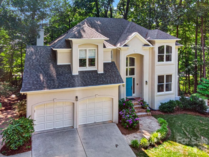 Water and nature enthusiasts will fall in love with the setting and lifestyle this exceptional home offers in a charming Lake Norman community, where lake access is just a two-minute walk from the front door. Spend your days floating at the swim dock, launching kayaks, canoes, and paddleboards from the community boat ramp, or setting out on the lake from the private neighborhood dock. Outdoor recreation continues with Jetton Park just one mile away, perfect for walking, biking, and enjoying the lakefront trails.
Inside, the home blends timeless finishes with spacious living areas and abundant natural light. Large windows throughout frame the surrounding wooded landscape, bringing the beauty of every season indoors. The open floor plan is ideal for entertaining, anchored by a thoughtfully designed kitchen featuring double ovens, a gas range, and an oversized island perfect for gathering with family and friends.
The walk-out basement opens to a screened porch and stone patio, creating a peaceful retreat where evenings are accompanied by the sounds of tree frogs, owls, and songbirds. The lower level also includes a large built-in storage room already plumbed for a future fourth bathroom. This flexible space is ideal for recreation, guests, or kids’ sleepovers, while the primary suite and three additional bedrooms upstairs provide privacy and separation from the activity below.
Nestled along the tree-lined streets of Chapel Point Lane, this home is part of a small, picturesque neighborhood known for its distinctive architecture and welcoming atmosphere. Despite its quiet setting, the community is conveniently located near top-rated schools, shopping, dining, and everyday conveniences. Pre-listing stucco inspection completed (04/08/2025) by a certified inspector, Morgan McClure. Documentation available by request. SELLER IS OFFERING $25,000.00 LANDSCAPING CREDIT!! $4,000.00 LENDER CREDIT OFFERED FROM OUR FAIRWAY LENDING REPRESENTATIVE.