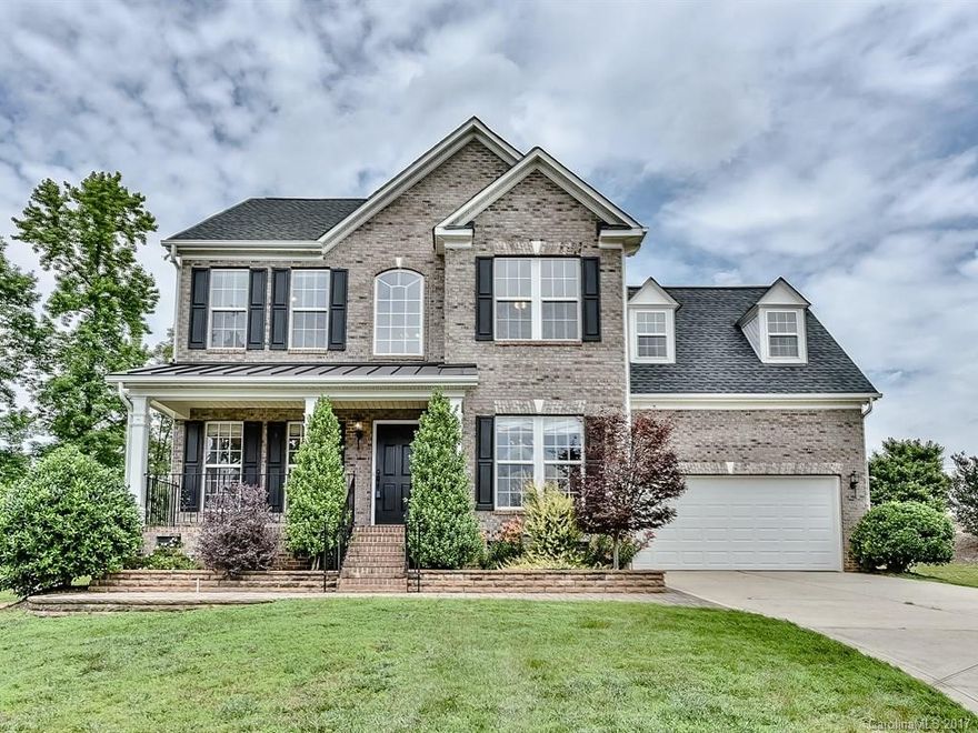 NEED SPACE?! This home has space! 3 Stories, 5 bedrooms at end of cul-de-sac. Elementary school next door.   4 Bedrooms on 2nd & 3rd levels.  Open main level great 4 entertaining w/formal/casual spaces + sun room.  Large kitchen, tons of storage/counter space. Hardwoods in all but 3 bdrms. Surround sound! Newer roof. Convenient to NC/SC border, Ft Mill By-Pass and approx 20 mins to Charlotte via I-77.  Low SC Taxes!