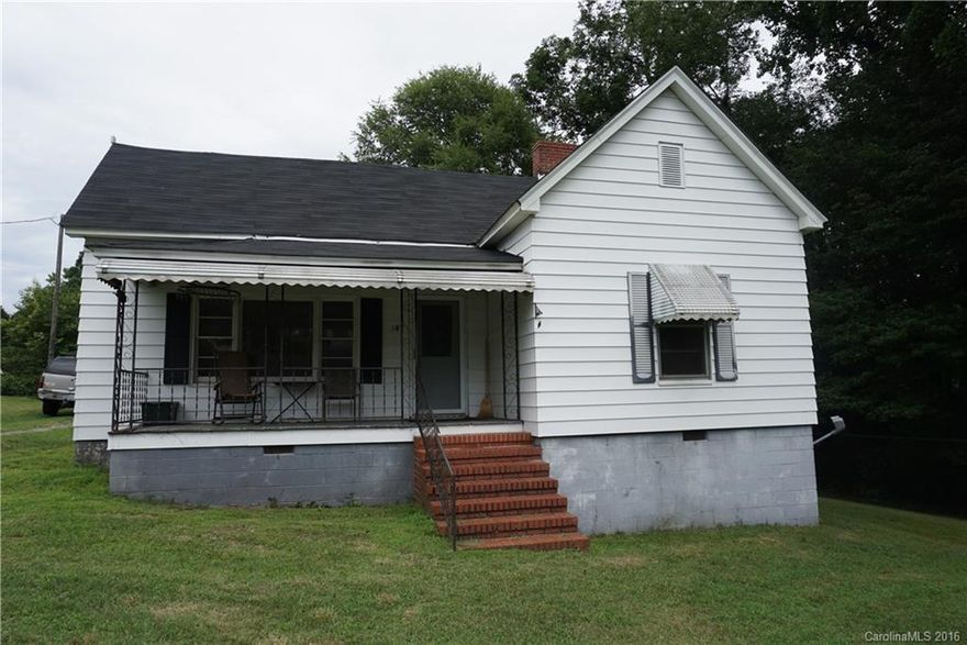 Nice cottage home freshly remodeled. New carpeting, paint, vinyl. 2 bedrooms. One bedroom has a divider to give additional bedroom space. Nice kitchen, newly remodeled. Bath has claw foot tub, shower. 2 storage buildings added since buyer purchased home. Very nice end of street location.