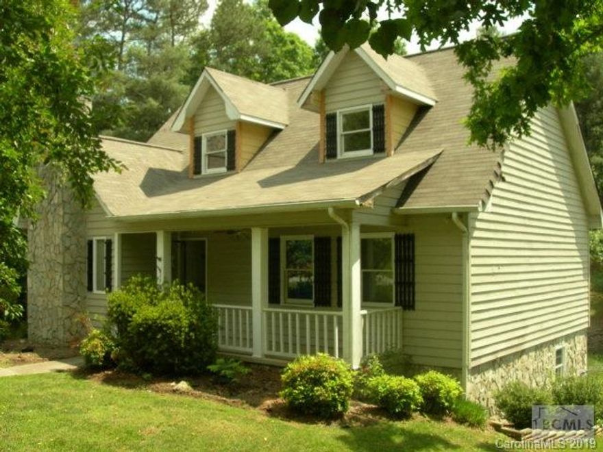 Great curb appeal from this 1.5 story home with full basement.  Covered front porch and nice rear deck for entertaining.  Interior has hardwood floors and fireplace with cultured stone.  Kitchen is missing appliances but has solid counter tops and tile back splash.  Large master bedroom with attached bath and two additional bedrooms and full bath upstairs.  Full basement with drive in garage and framed up additional bedroom.  Big back yard with plenty of room for kids or pets.