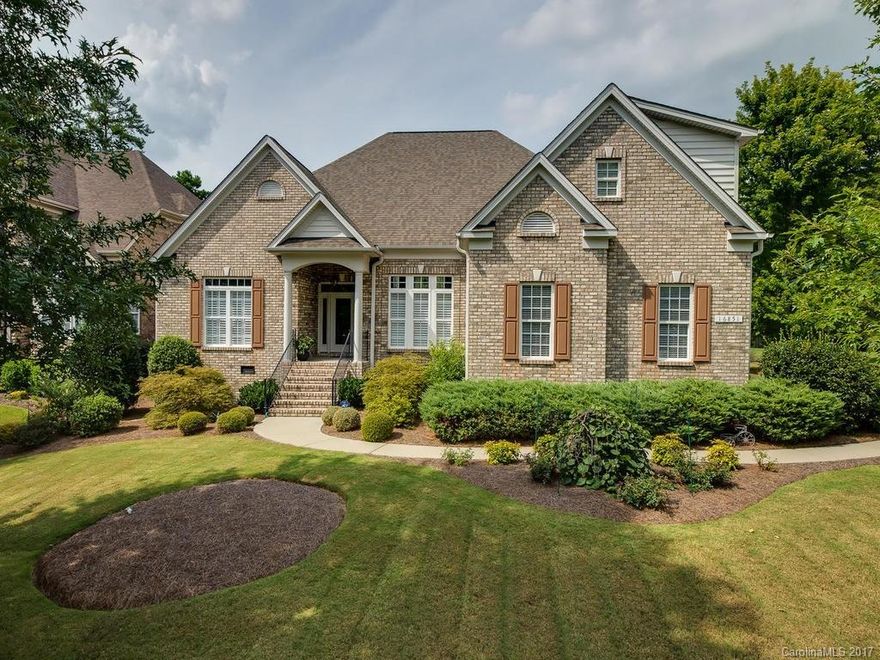 Pristine condition full brick home on Jack Nicklaus Golf Course hole #9. Rare find, one story ranch floorplan with bonus room & full bath upstairs. Upgraded! Open & bright floorplan, hardwoods, plantation shutters & blinds throughout. Double ovens, kitchen open to great room and fireplace. Central vac, deck and level backyard overlooking golf course. HOA includes pool, fitness ctr, clubhouse, basketball, walking trails. Golf & tennis memberships available. Equestrian Ctr located in Palisades.