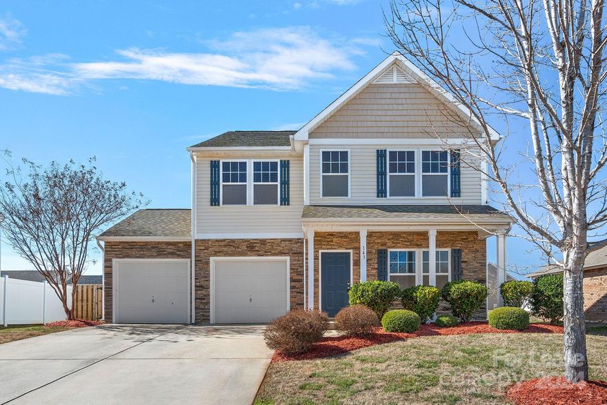 Welcome to 143 Water Ski Dr. with a quaint rocking chair front porch, open-concept floor plan, and large, fenced back yard. Newly painted throughout with new carpeting and LVP flooring, the crisp, open floor plan is sure to please.  Well-equipped kitchen with breakfast bar and island is central to the living room and dining area, with access to the back patio, perfect for those occasions with outdoor meals. You'll love the built-in drop-zone for keeping those everyday essentials within reach, as well as the main level office for those work or study-from-home days.  Three bedrooms, including the primary bedroom with ensuite bathroom, an additional full bathroom, laundry room, and a bonus room complete the upper level. Plenty of parking between the garage and driveway.