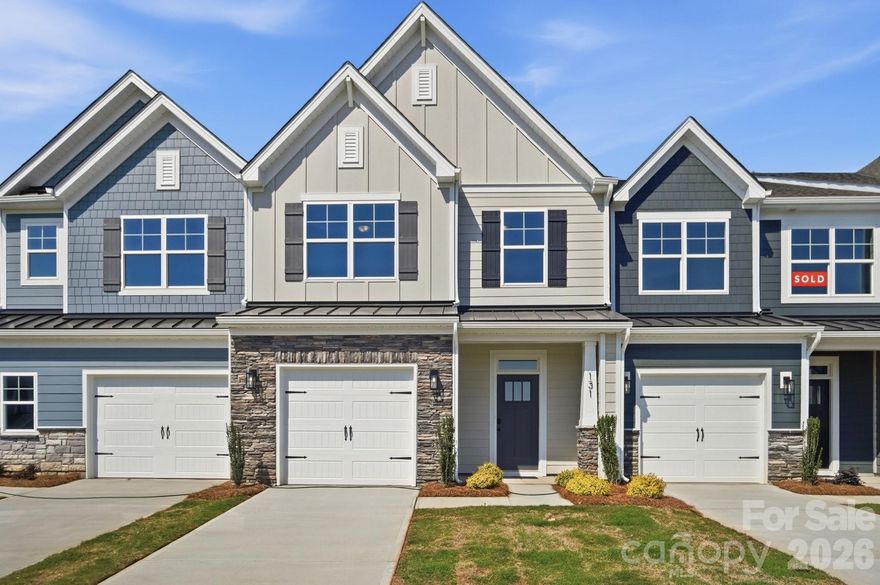This Ashland plan has 3 bedrooms, 2.5 baths, and more than 1,800 square feet of living space. Enter the home through the foyer with tray ceiling, Craftsman-style trim, and a convenient, beadboard drop zone to see the open kitchen, dining area and family room that walks out to a covered porch. The kitchen features white, Shaker-style cabinets and white quartz counters, a spacious island, white tile backsplash, and stainless appliances, including a gas range. The open main floor has beautiful and durable Enhanced Vinyl Plank flooring throughout. Stairs with composite treads and metal balusters lead upstairs to the loft, bedrooms, full baths and laundry room. The primary bath has a tiled shower with bench seat, dual-sink vanity, and linen closet. The upstairs full bath has a tub/shower combo. Walking distance to shops, eateries, and other conveniences. Visit today!