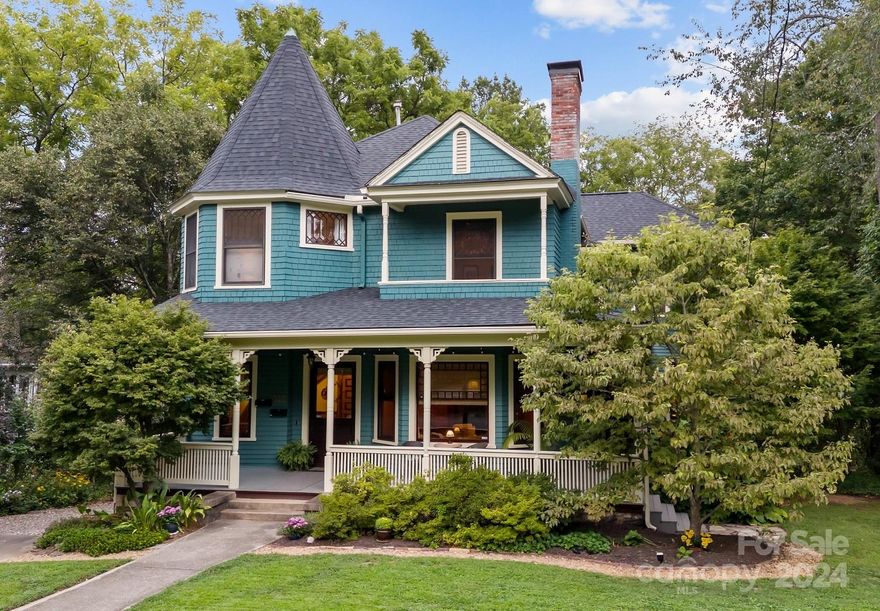 Constructed in 1896, the Elnathan P. Brownell house is a beautiful seventeen room Queen Anne Victorian w/ a ground level apartment in the heart of Asheville. This 2003 Griffin award-winning 4 bd, 4 ba home sits on a spacious .41 acre lot w/ plenty of space for outdoor living. Step inside to the abundance of original features including beautiful millwork, fireplaces, hardwood floors & vintage windows. The chef's kitchen includes a 48 inch Thermador range, while your private primary suite includes a sitting area, balcony, ensuite bathroom bathed in natural light w/ separate soaker tub, walk-in shower & closet. The separate, 1 bedroom apartment is a secondary unit with its own living quarters. 2 driveways offer plenty of parking. Recent & notable improvements include new HVAC units (2019), roof replacement (2021), complete rebuild of the front porch flooring (2022), & painting of the entire exterior (2023). Come see this historic beauty to appreciate its grandeur and amazing setting!
