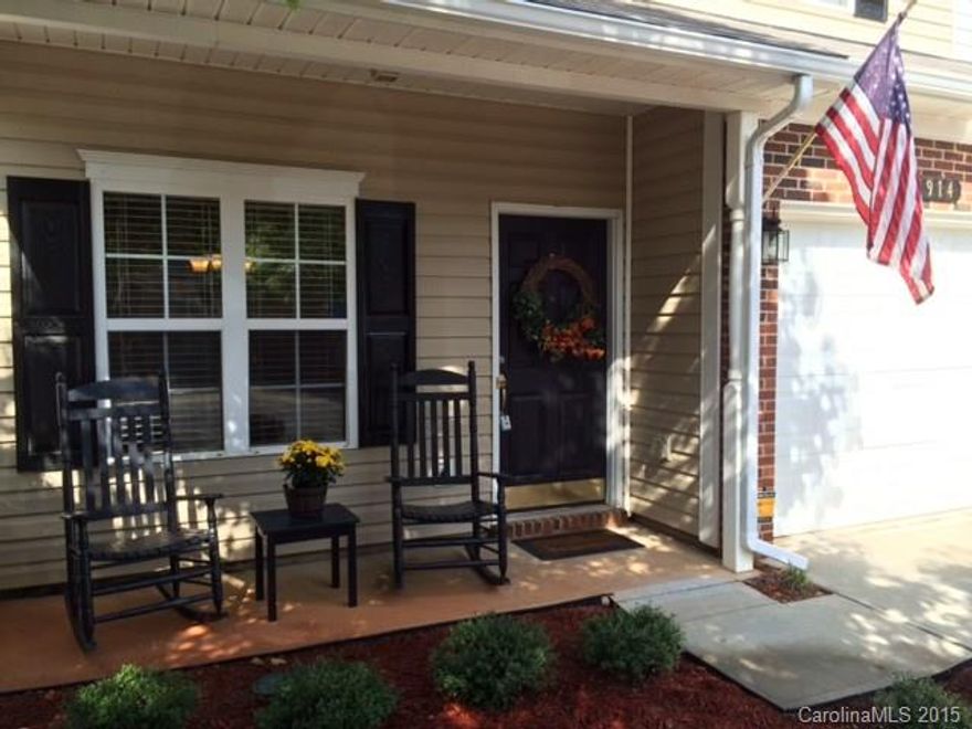 Welcome Home to this Charming, 3 Bedroom, 2 and 1/2 bath, Well-maintained home !  Open Floor Plan, Upgraded lighting, cabinetry, new laminate hardwood flooring with new carpet in Spacious bedrooms.  Master Bedroom has an in suite bathroom with a huge spacious walk-in closet.  Convenient upstairs laundry, freshly painted interior, Sunny Breakfast Room and Separate Dining Room, Rocking Chair Front Porch with a rear patio for outside entertaining.  Award-winning Fort Mill Schools