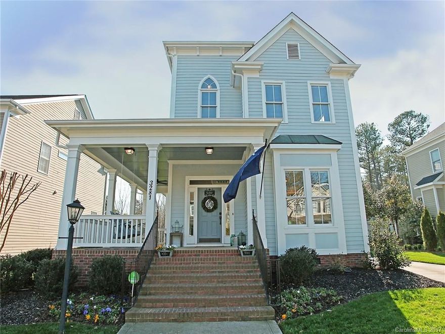 Welcome Home to this Warm & Inviting Beauty with Wrap Around Front Porch! Flowing hardwoods on main! Great Room with gas fireplace. Kitchen with stainless steel appliances, rich, cabinetry, breakfast bar & breakfast area & granite counter tops! Level, lush back lawn that backs to woods. Front Porch has swing! Offering Baxter’s lifestyle of parks, playgrounds, pool, tennis, trails plus walking distance to the Library, restaurants & shopping and just minutes from I-77!