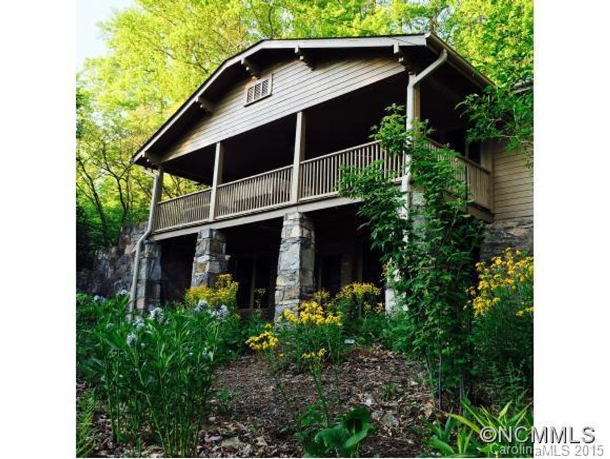 Prepare to fall in love. 1920's Arts and Craft style stone and wood home. All the charm of its heritage with many recent updates. Original wood floors, bead-board, stone fireplaces, original doors and hardware. This home reflects the love and character not usually found in newer homes. Stone walls, gardens and a fountain. Drive through carport. Potting shed. Mother daughter possibilities