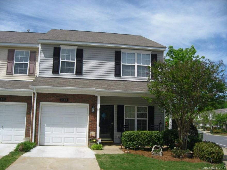 One of the few 3 bedroom/3 full bath units in the neighborhood!  This one won't last long.  End unit, extra large patio with fencing, two masters, up and down. Sunny family and dining room in addition to cozy loft on second floor. Rocking chair front porch. Close to everything! Fort Mill Schools. Second laundry hook-up under stairs for first floor master.