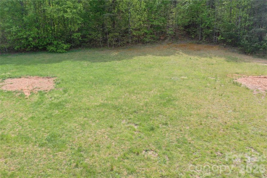 Discover this 0.89± acre tract in Connelly Springs, NC located within the established Kayla’s Ridge subdivision, offering a great mix of usability and convenience. The property is mostly cleared, providing a strong head start for a future homesite with minimal prep work needed, while still leaving room to shape the land to your vision. With road frontage already in place, access is straightforward and adds to the overall build-ready appeal. Whether you’re looking to build a private residence, secure a manageable piece of land as an investment, or hold for future development, this property offers flexibility in a quiet, rural setting. The manageable size makes it easy to maintain, while the surrounding area provides the peaceful atmosphere many buyers are seeking. Opportunities like this where usability, location, and access come together are getting harder to find in this part of Burke County.