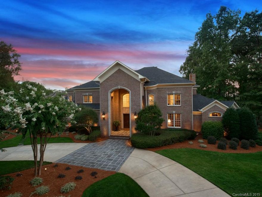 Come home to this sprawling 1.07 acre estate in The Peninsula on Lake Norman. Built by one of the area’s most prominent builders known for his lavish finishes; braided crown moldings, rounded walls, hidden rooms, 8ft doorways & dramatic staircases-this home is no exception. Guest suite on the main floor; each bedroom is a large suite. Step outside to the infinity pool & dazzling lake w/twin boatslips. Circular motor drive for visitors; additional drive to 4 car garage is tucked out of sight.