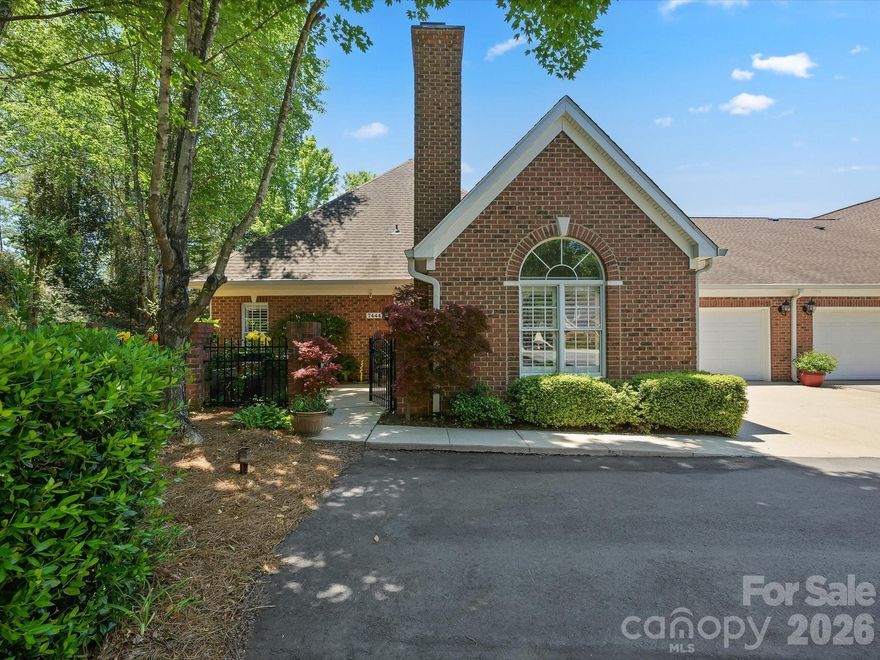 Experience refined living in the exclusive gated  enclave of Piper Glen Country Club. This beautifully updated patio home offers elegant one- level living filled with natural light, soaring vaulted ceilings and sophisticated finishes throughout. The dramatic Great Room showcases a stunning stone fireplace, expansive palladian window and plantation shutters, creating a warm yet impressive gathering space. The spacious Dining Room flows seamlessly into the Chef's Kitchen featuring white cabinetry, granite countertops, stainless steel appliances, breakfast bar and abundant storage. Retreat to the vaulted Primary Suite with an oversized walk-in closet, and beautifully updated spa-inspired bath. The vaulted Secondary Bedroom is perfect for guests or a private home office, complete with built in desk and bookshelves. plus and updated travertine marble bath with walk in shower. Step outside to a private courtyard designed for relaxing mornings, gardening or effortless outdoor entertaining. Additional highlights include a generous laundry room, attached 2-car garage with extra storage, and low maintenance living at its finest. Residents enjoy access to a clubhouse and saltwater pool, while HOA includes lawn maintenance, Google Fiber, water & sewer. Optional Memberships are available at TPC Piper Glen. Ideally located near Stonecrest & Piper Glen Shopping Centers, Trader Joe's, Starbucks, fine dining & McAlpine Greenway. A rare opportunity to enjoy luxury convenience, and a carefree living in one of South Charlotte's most desirable Communities, WELCOME HOME!