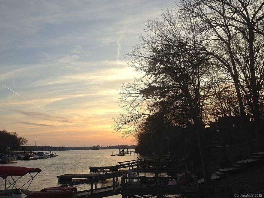 Awesome Waterfront End Unit Townhouse w/Shared Dock in beautiful Tega Cay. Feel like you are on vacation year round in this lake front paradise. 3 bdrms/3 full baths, 1 bed/bath on main level, living/dining combo, spacious screen porch w/fabulous view, huge great room w/fireplace, large partially covered patio leads out to the dock and is great for entertaining. Enjoy all Tega Cay has to offer!