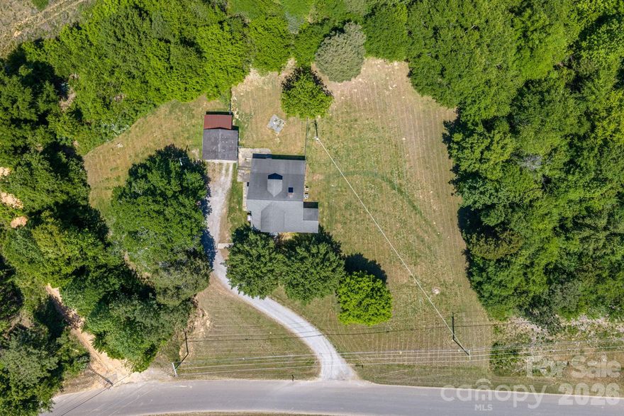 UNLIMITED POTENTIAL | 1.59 ACRES | KINGS MOUNTAIN GEM
Rare investment opportunity in the heart of Kings Mountain! This 1958 original farmhouse offers a massive footprint of nearly 2,700 sq. ft. on a sprawling 1.59-acre lot. While officially permitted for 3 bedrooms and 2 baths, the intuitive layout currently functions as a 5-bedroom home, providing immediate value-add potential. This is the perfect "fix and flip" or "buy and hold" for your portfolio. The property features a private well and septic system, a detached storage building/workshop, and a double carport. Whether you're looking to restore its mid-century charm or execute a modern overhaul, the bones and the acreage offer a canvas like no other. Sold AS-IS, SELLER WILL NOT MAKE REPAIRS OR PROVIDE ANY CONCESSIONS, —don’t miss the chance to capitalize on one of the best price-per-square-foot opportunities in the area!

Great opportunity for investors or renovators. The home features a new water heater (2024), though the roof (2006) shows active signs of leaking. Floor repairs are needed in the laundry room and kitchen (currently reinforced with plywood). Because the seller has not resided in the property for 20+ years, they possess limited knowledge of its systems and offer the home with no representations as to condition.