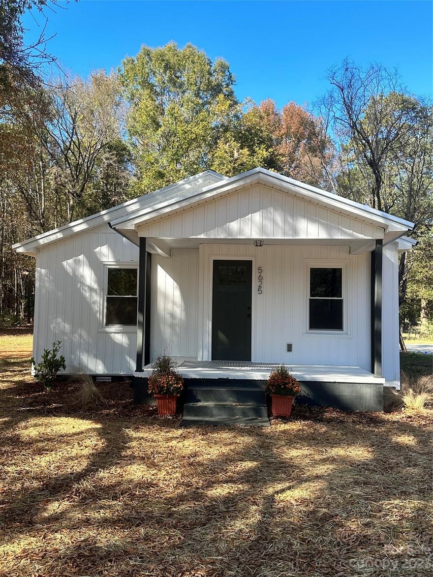 You don't want to miss this beautiful, fully remodeled, 3 bed/2 bath farmhouse on 1.2 acres in the quiet countryside of Cabarrus County. Desirable Mount Pleasant schools, without the city taxes. Only 5 minutes to Lane Street exit (63), less than 15 minutes to either Downtown Mt.Pleasant or Concord. Enjoy the country, while still close to shopping and dining. 

No stone was left unturned with this gorgeous home. All new in 2023: metal roof, siding, joists, girders, subfloor, tile showers, granite countertops, 100% waterproof laminate flooring throughout, paint, plumbing, wiring, HVAC, pumped septic with additional lines installed, stainless steel appliances (fridge, dishwasher, oven), fixtures, cabinets, crawlspace underlayment.

12 x 8 foot outdoor storage building with loft included! 

USDA eligible area! Seller is offering $500 toward home warranty with acceptable offer!