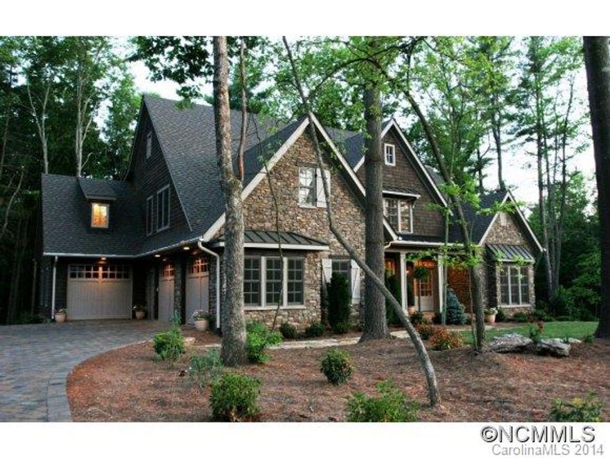 Tons of recent updates to this custom French Country home in the Ramble. New rustic tile floors throughout main, redesigned kitchen w/2butcher block islands, living room w/new projector & drop screen, large master w/sitting room & vaulted ceilings, 3BR/2BA upstairs, home theater & incredible screened outdoor living area w/kitchen, grill, stone fireplace, new wooden deck w/fireplace and privacy fence. Adjacent homesite available-see MLS#572106.