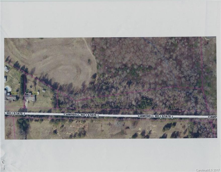 Great building lot with over 1,000 feet of road frontage on Campbell Road and a creek streaming through the eastern portion of the property. An engineered alternative septic system would be required at a cost of approximately $16,000, including all permits as well as 2 year maintenance.  Contact Agent for more information.