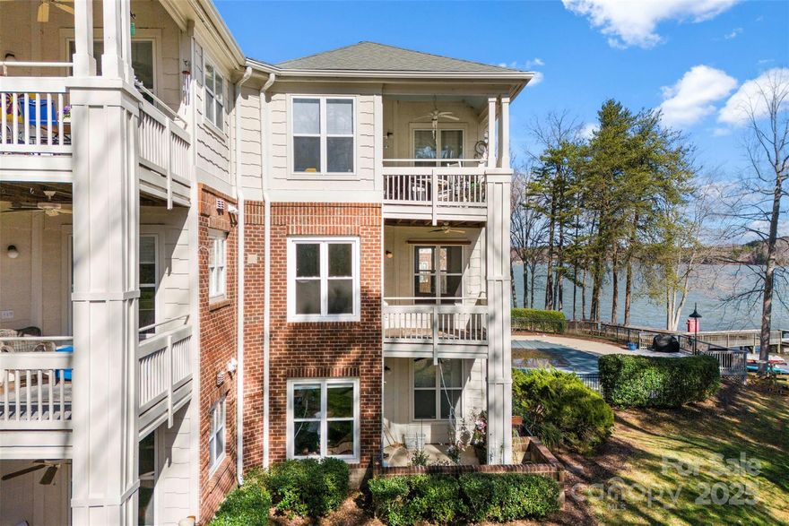 Welcome to this stunning lakefront end unit condominium at 921 Northeast Drive, Unit 26 in Davidson, North Carolina! Enjoy breathtaking lake views from this private, spacious end unit, offering the perfect blend of tranquility and convenience. Access the condo with ease via either the elevator or stairs. As a resident, you'll have access to the community pool, perfect for relaxing or entertaining. Plus, you'll be within walking distance to grocery stores, shopping, dining, and charming downtown Davidson, making it easy to enjoy all the best that this vibrant community has to offer. Whether you're seeking a peaceful retreat or a lively lakeside lifestyle, this condo is the ideal place to call home!

Condo was recently painted, so please excuse the fumes!
