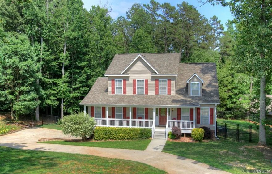 Spacious Three Bedroom Home with Screen Porch & Fenced Backyard located in the cul-de-sac on an Acre lot. Enjoy entertaining friends and family in the oversized great room or dining area.  Any chef will appreciate this kitchen with double ovens, microwave and ample counter space.Master suite is located on the main level.  Additional bedrooms located on the second floor. Relax on the screen porch overlooking your wooded yard after a long day. Storage in basement in garage.  7 minutes from town.