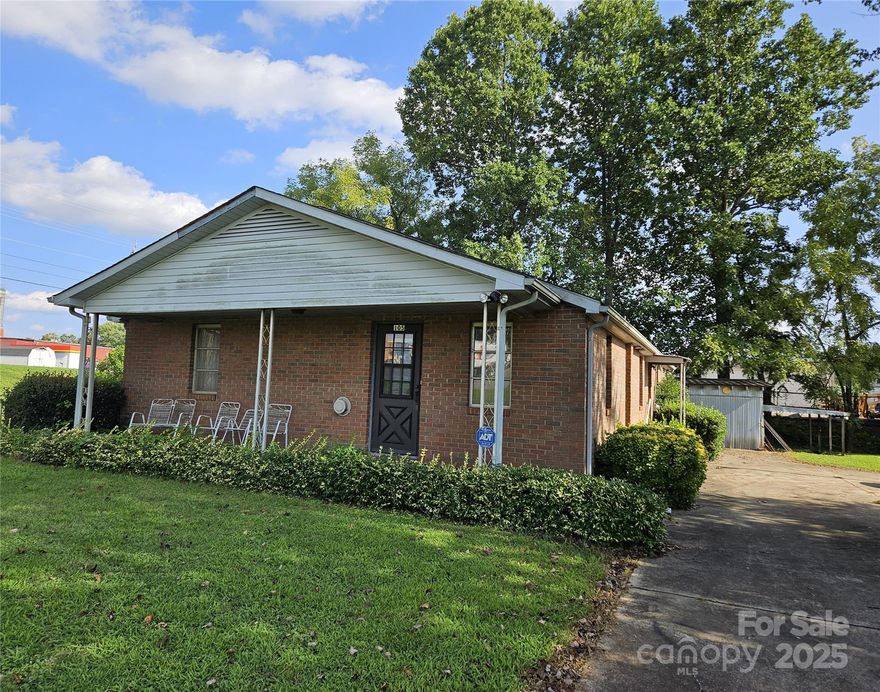 Great location for a business!  Residential property zoned commercial.  4 bedroom home with basement and a detached garage with great storage space. Entrance great for a reception area or office, kitchen, family room and 
4 Bedrooms, (great for offices) two baths. The basement is partially finished and could be a classroom or additional office space or storage. Bookcases remain. Entrance to outside. Large detached garage, mechanic work space or storage. Plenty of space for parking or additional building.  Easy access to highway, shopping center, restaurants, hospital and downtown area.