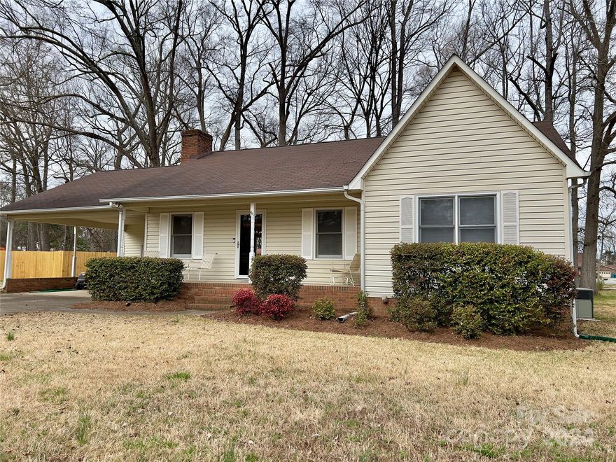 Experience the warmth of this welcoming neighborhood! Conveniently located in the heart of Harrisburg, this home provides easy access to all the city's amenities and attractions. This Ranch style layout boasts 3 Bedrooms and 2 Full Baths, ensuring comfortable and practical living spaces for your family. The Primary bedroom features a walk-in closet for ample storage. Kitchen is equipped with a gas cooktop, while the great room features a woodburning fireplace. The laundry room, adjacent to the breakfast area, comes complete with built-in cabinets and shelving for enhanced organization. Attached Carport. Newly constructed 10 x 10 rear deck to entertain guests or unwind. Nestled in a well-established neighborhood without an HOA, this home sits amidst a mix of new and existing homes. With a generous .57-acre corner lot, there's plenty of space for outdoor activities. Additional amenities include a utility/storage room conveniently situated off the carport and additional parking pad.