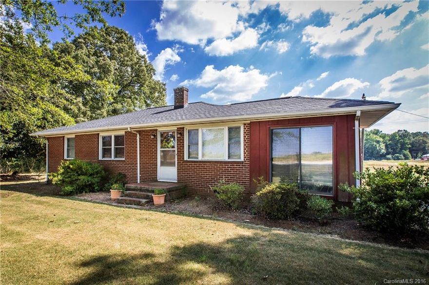 This 1-Owner Brick Ranch w/tons of character is perched on Prime Farm Land offering Rd Frontage on both Hwy 161 & Brown Oates Rd. These 2 Level Tracts Total 14.24 Acres & spot light an Eclectic Lg. Red Barn & Out Building for storage. Whether you’re Building Add’l homes, Riding Horses, or Farming Cattle, this one of a kind property & Ideal location is close to conveniences & less than 10 miles from I 77. Easily Sub-divided w/No Restrictions on 6397/6431 Old York Rd, York SC. Welcome!