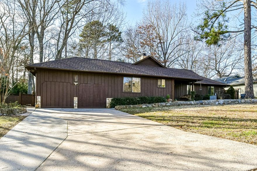 Welcome to this well appointed and meticulously cared for ranch home off Sardis Rd N. This home has 3 bedrooms, 2 bathrooms, plus a large den that could be easily converted into a garage or any other desired use. New flooring all throughout the home, and new carpeting in the primary bedroom. The serene backyard welcomes you with trees, beautiful stonework, a work shed, and a covered hot tub room that could be converted into a greenhouse if desired, and sits on one of the best lots in High Timbers! All appliances convey including Washer/Dryer, fridge and double oven. This home is only minutes from downtown Matthews, and is surrounded by great shopping centers. You cannot beat this location! Convenient to East Independence and Providence Road.