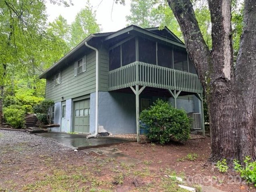 If you are looking of a peaceful home in a woodland setting look no further! This traditional 3 bedroom, 2 full bath home is the perfect blend of rustic charm and character. With its mature native landscape and serene surroundings, you'll feel like you're living in your own private subdivision. Inside, the home offers a finished lower level with loads of potential for a family room, home office, or even a guest suite. The garage comes complete with a built-in workbench, perfect for all your DIY projects. Whether you're looking to relax in nature or unleash your creativity with some home improvements, this property has it all. With a little TLC this place would be a awesome home or a second home for someone. Don't miss out on the opportunity to make this charming abode your own.